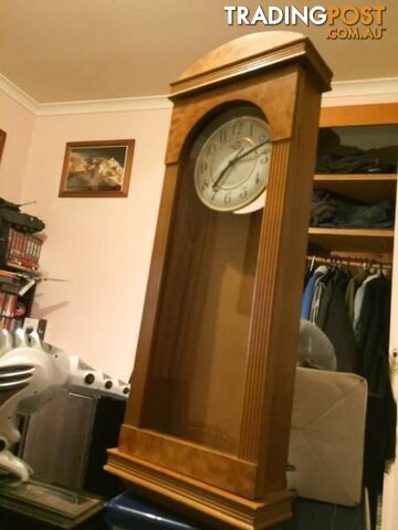 WALL MOUNTED CLOCK IN WOODEN CASE WITH GLASS DOOR