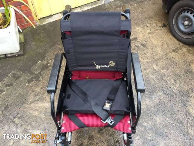 WHEELCHAIR IN GREAT CONDITION WITH SEATBEALT & ARM LIFTS