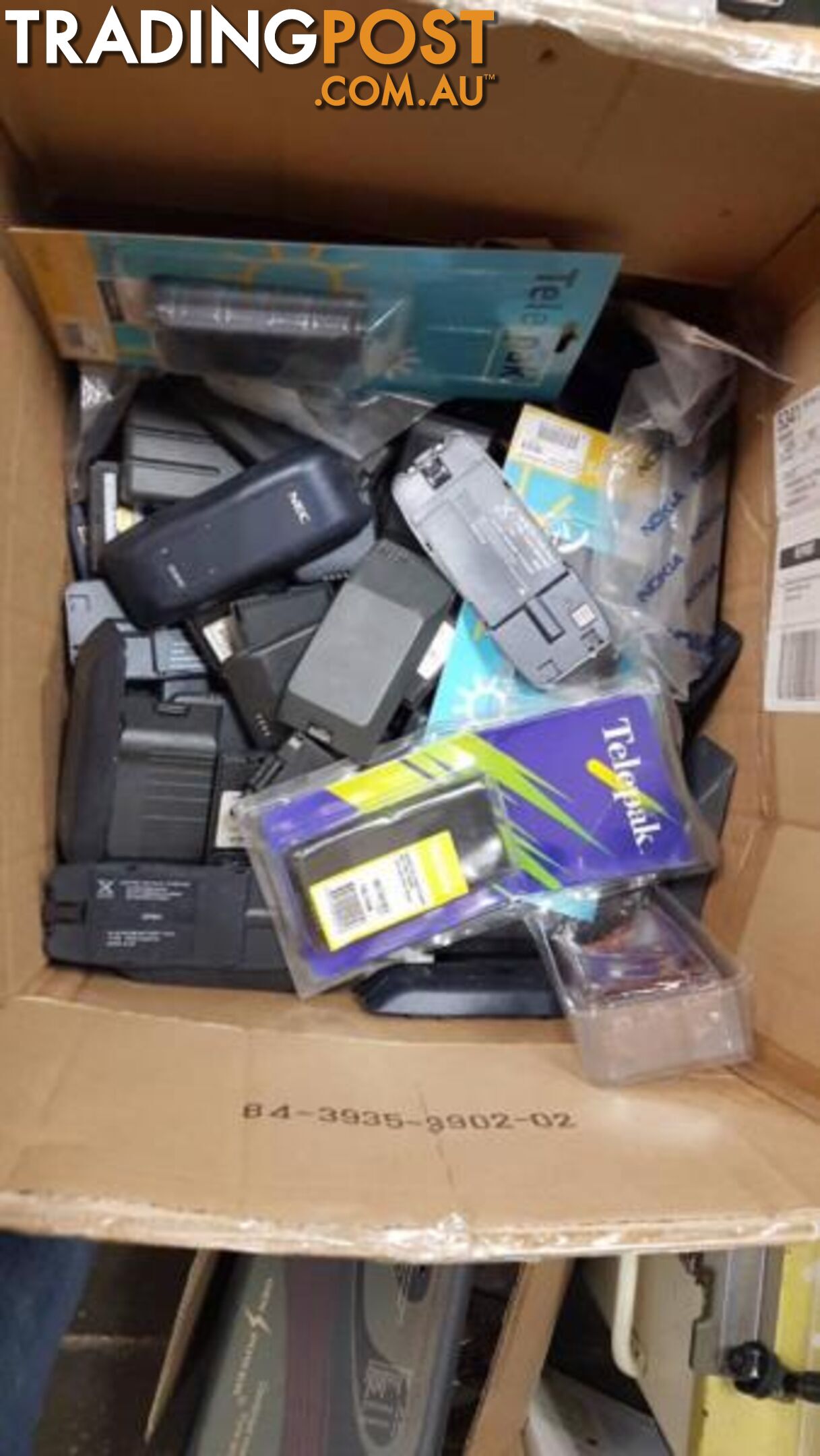 Box of Miscellaneous Phone Batteries