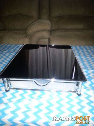 Black Glass top storage table