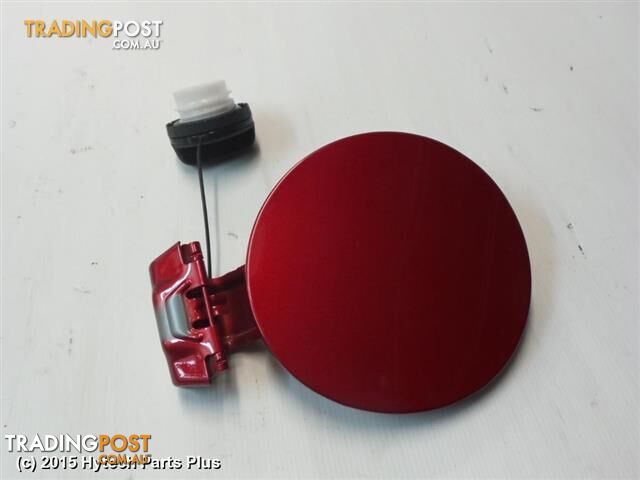 2013 MAZDA CX5 FUEL DOOR / FILLER maroon