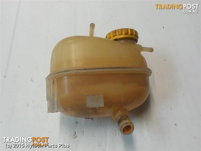 2002 HOLDEN BARINA OVERFLOW BOTTLE