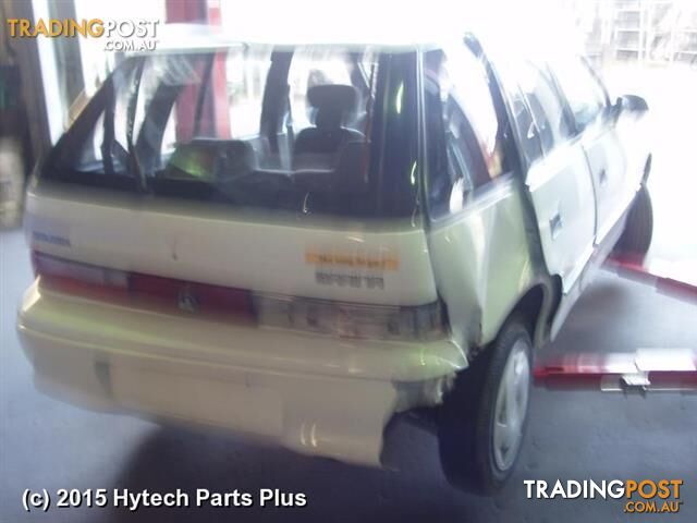 1993 HOLDEN BARINA OVERFLOW BOTTLE