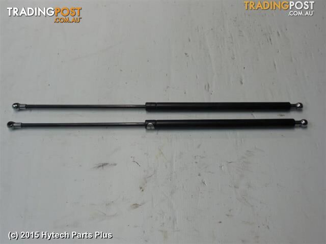 2002 HYUNDAI ELANTRA HATCH STRUT pair tested good - photo 2 of 2