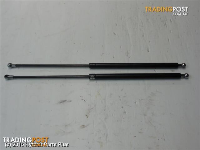 2002 HYUNDAI ELANTRA HATCH STRUT pair tested good - photo 1 of 2
