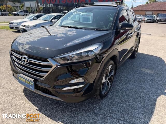 2015 HYUNDAI TUCSON HIGHLANDER (AWD) TLE WAGON - photo 4 of 34