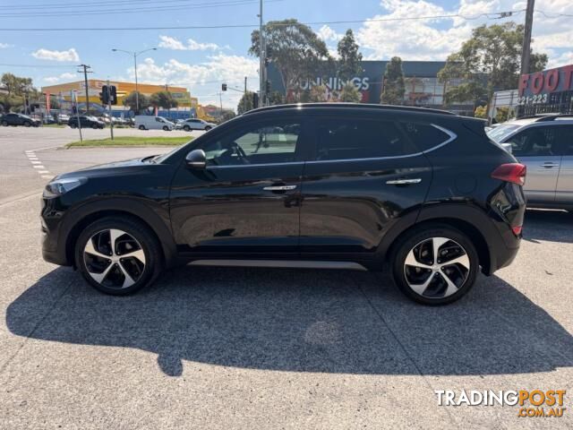 2015 HYUNDAI TUCSON HIGHLANDER (AWD) TLE  WAGON - photo 5 of 34