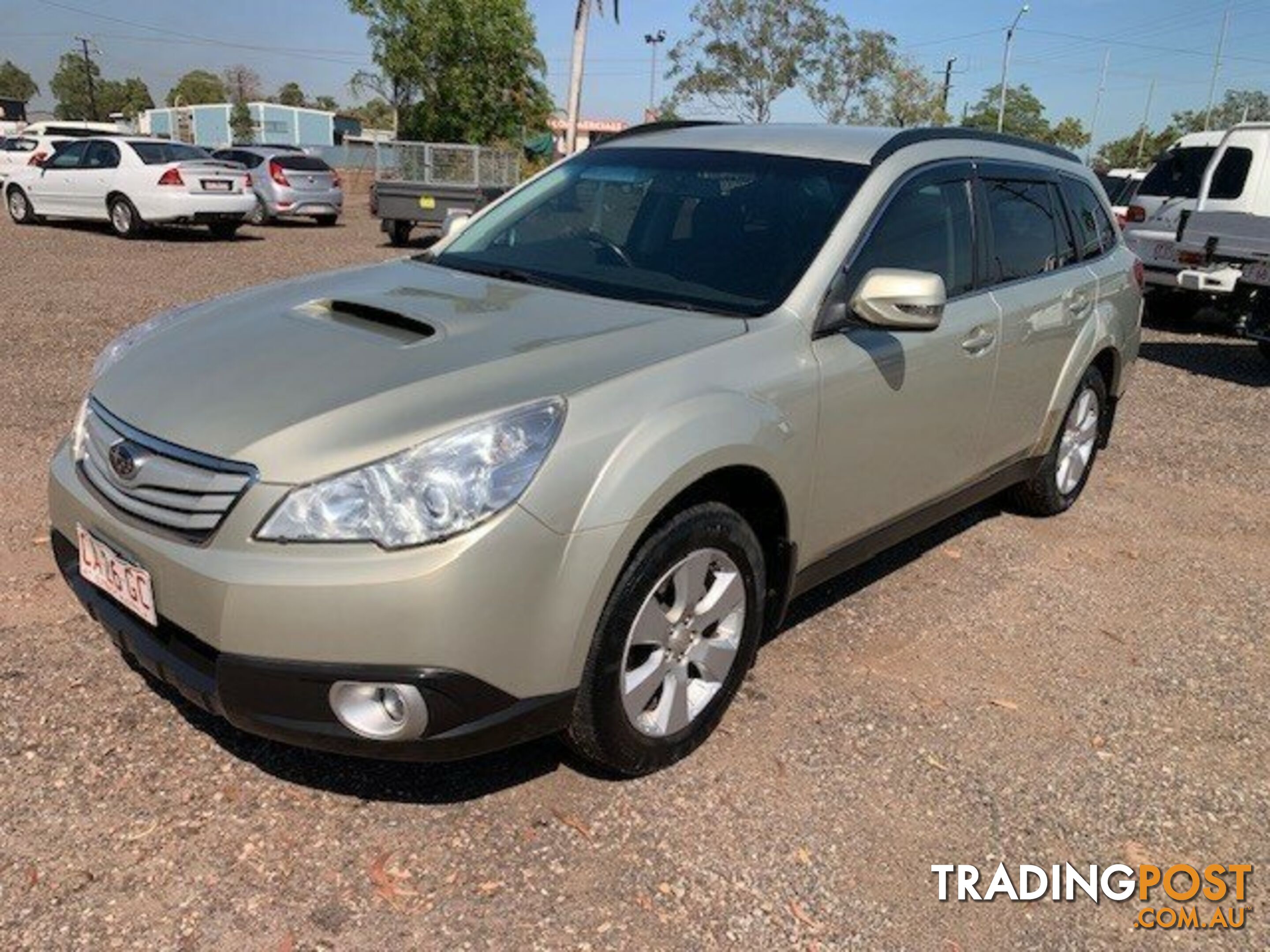 USED 2011 SUBARU OUTBACK GOLD 6 SPEED MANUAL WAGON