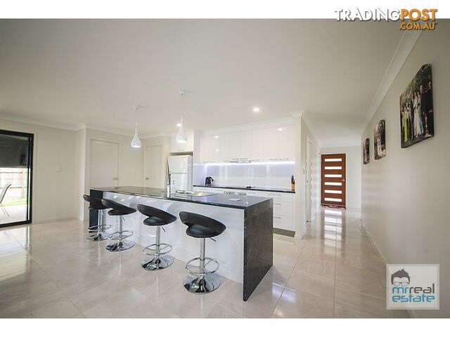 8 Belbowrie Avenue Norman Gardens QLD 4701