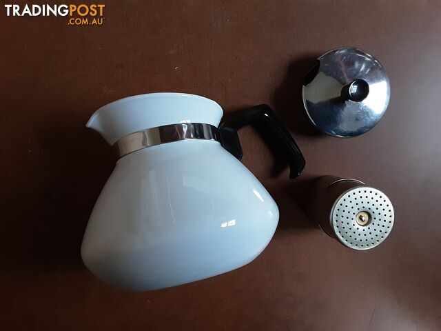 White ceramic teapot