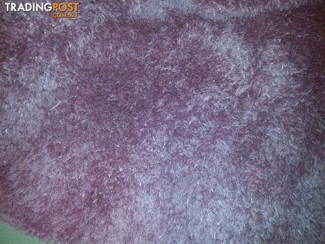 pink shaggy rug