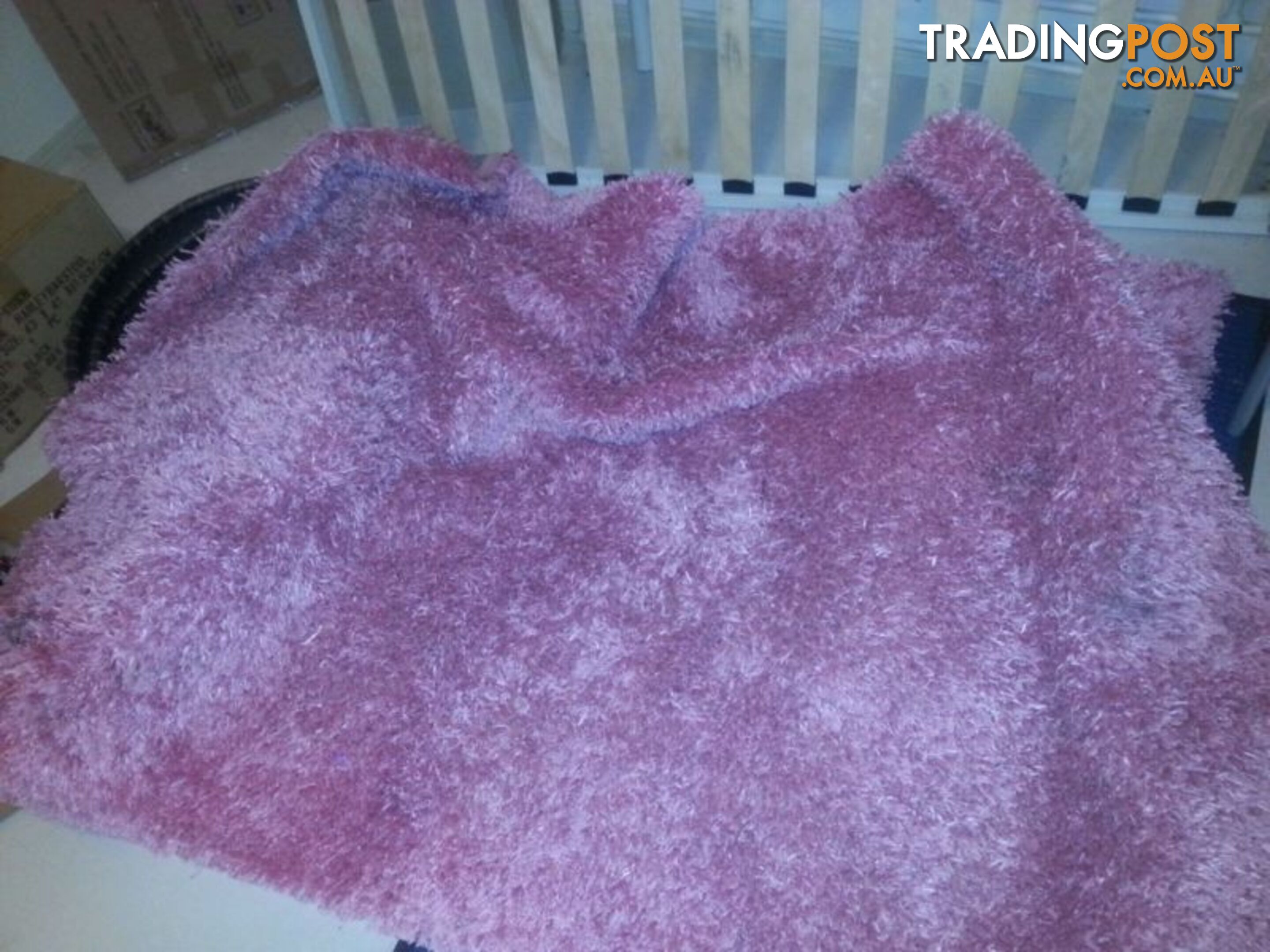 pink shaggy rug