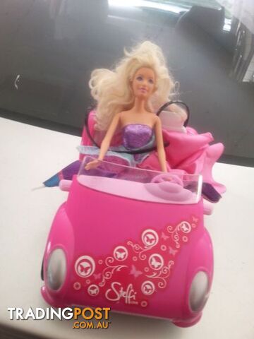 barbie and her car