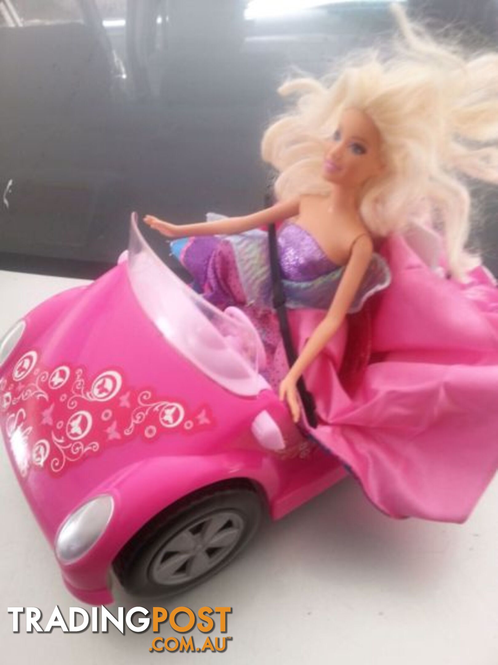 barbie and her car