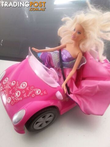 barbie and her car