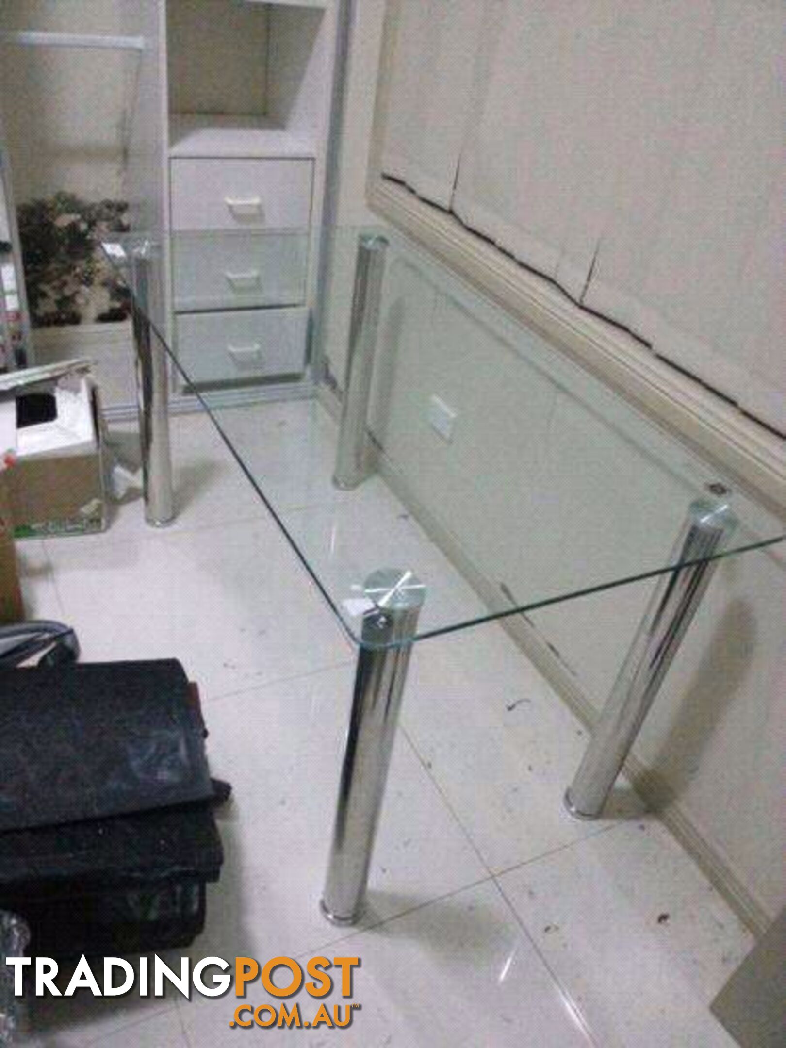 glass table with chrome legs