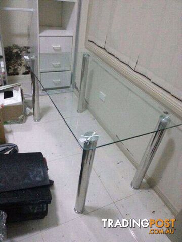 glass table with chrome legs