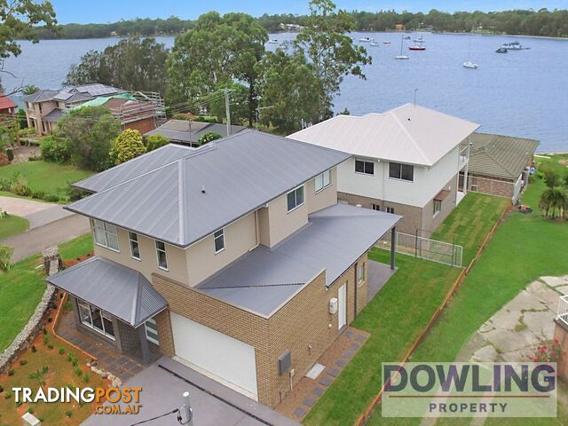 48 Caswell Crescent TANILBA BAY NSW 2319