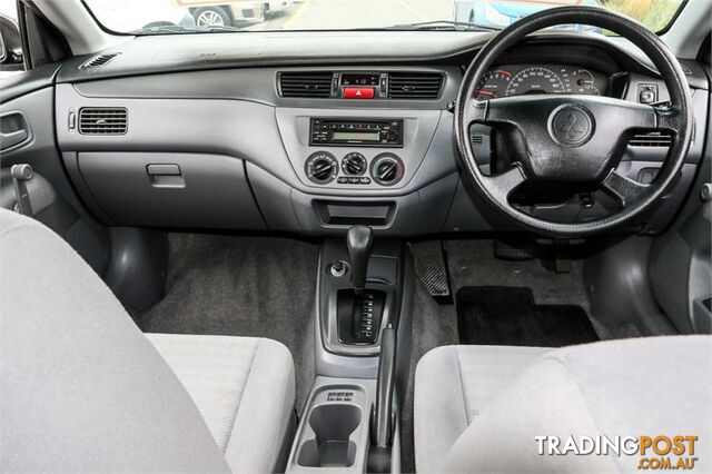 2004 Mitsubishi Lancer ES CH Sedan - photo 3 of 20