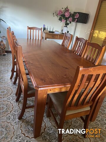 Timber dining table and 8 chairs