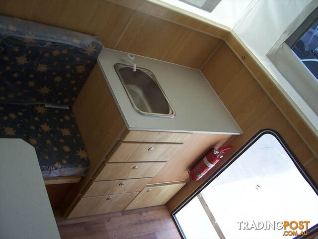 COSMIC SLIDE ON CAMPER - photo 2 of 7