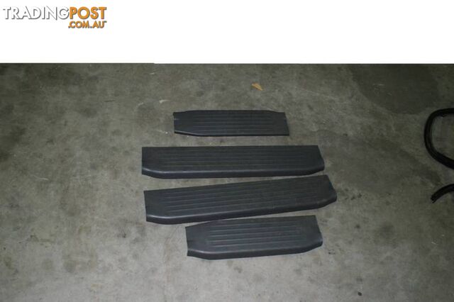 Toyota Hilux SR5 05-14 door sills. great condition Gray colour