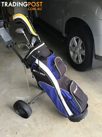 Left handed golf clubs, bag and trolley