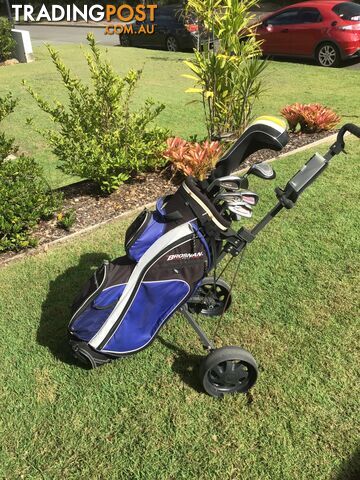 Left handed golf clubs, bag and trolley