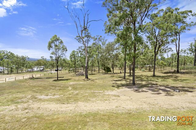 31 Poinciana Avenue RIFLE RANGE QLD 4311