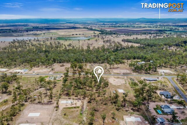 31 Poinciana Avenue RIFLE RANGE QLD 4311