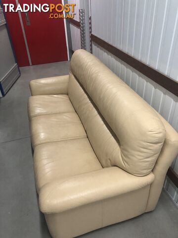 Three seater Cream Coloured Leather Sofa