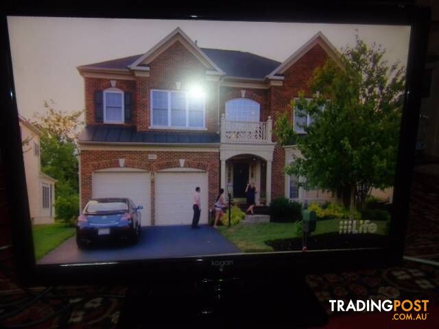 24 inch Kogan LED Slim & light TV, DVD Player Base & Remote - photo 2 of 8
