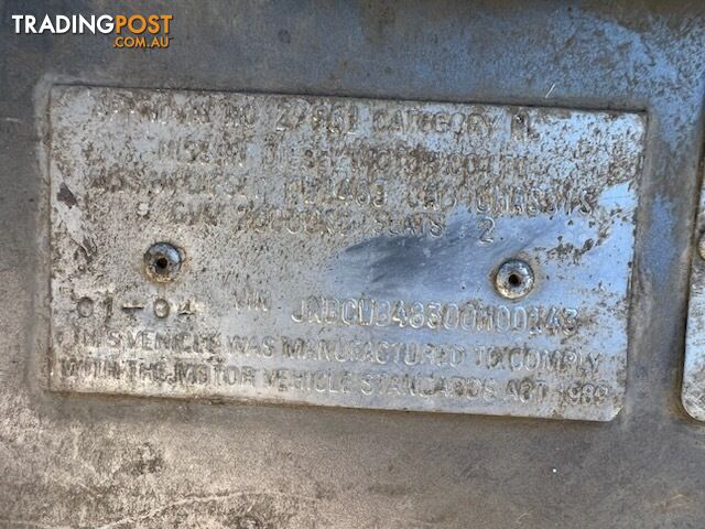 2004 NISSAN CWB483 2212 JNBCWB48300H00143 - photo 5 of 8