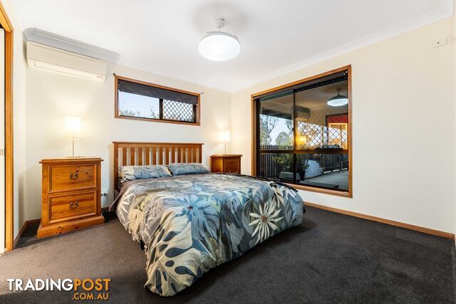 6 Lewis Drive MERINGANDAN WEST QLD 4352 - photo 4 of 17