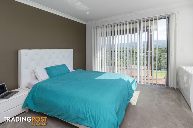 9 Huntington Drive MAUDSLAND QLD 4210