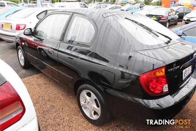 2003 Hyundai Accent GL LC Hatchback - photo 3 of 18