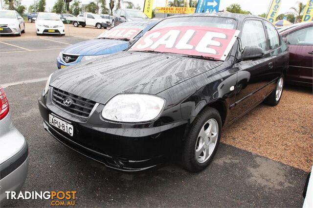 2003 Hyundai Accent GL LC Hatchback - photo 2 of 18