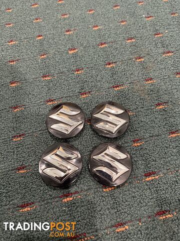 Suzuki wheel caps x4