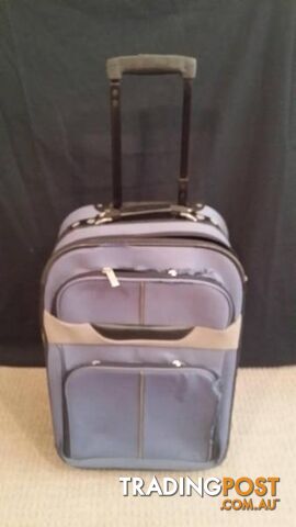 Assorted Suit Cases - Carry on Luggage