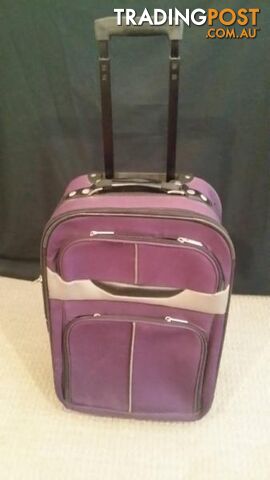 Assorted Suit Cases - Carry on Luggage