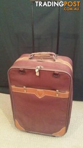 Assorted Suit Cases - Carry on Luggage