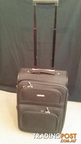 Assorted Suit Cases - Carry on Luggage