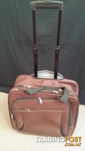 Assorted Suit Cases - Carry on Luggage