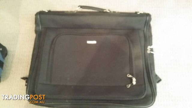 Assorted Suit Cases - Carry on Luggage