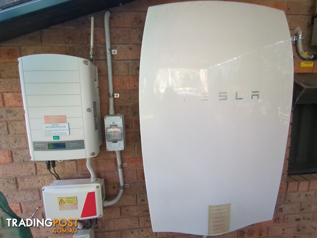 Tesla Power wall 1 with Solar Edge inverter.