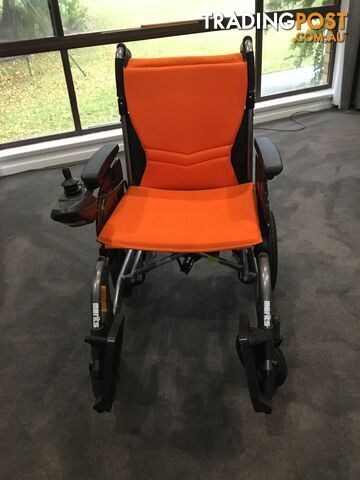 Merits Classic E-Power Wheelchair. As new. Will deliver. Reduced to sell