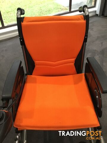 Merits Classic E-Power Wheelchair. As new. Will deliver. Reduced to sell