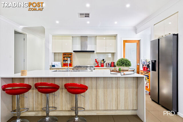9 Protea Way JORDAN SPRINGS NSW 2747 - photo 4 of 11