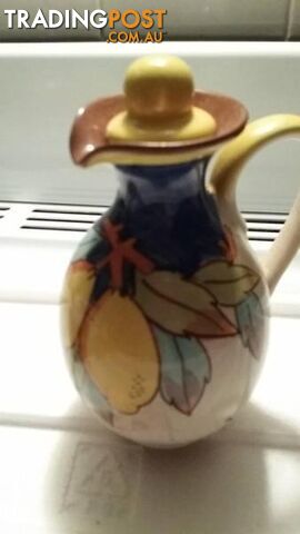 decorative jug with lid