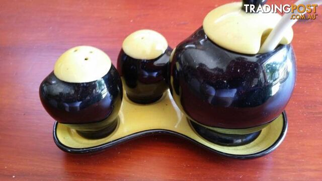 salt and pepper shakers with mustard pot
